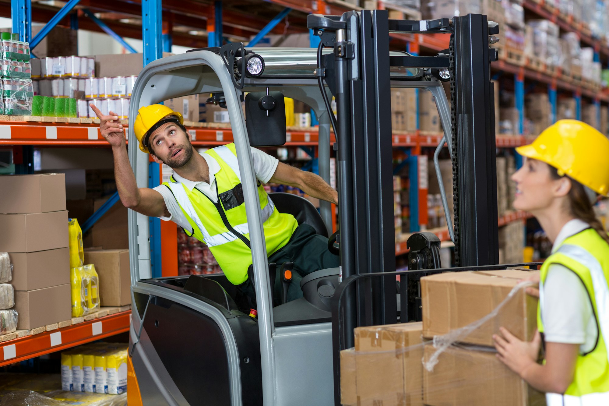 Male worker using forklift Male worker using forklift